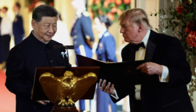 Trump’s Tarmac Theatre—The Unprecedented Handshake with Xi